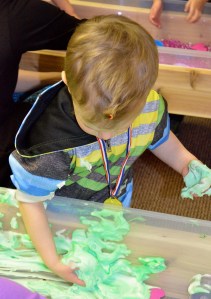 preschool sensory table shaving cream and paint messy play