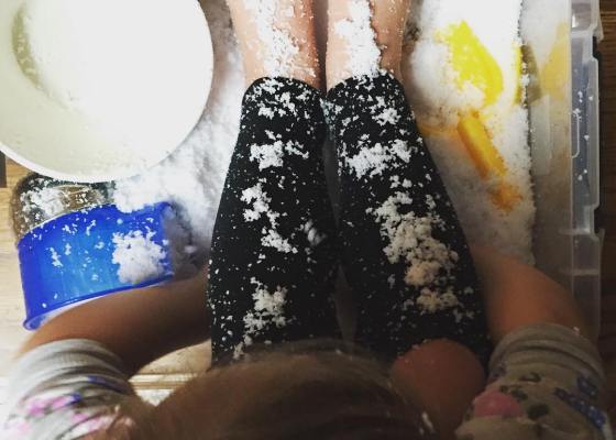 indoor sensory play in snow during dinner time